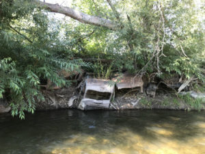 cars in river bank