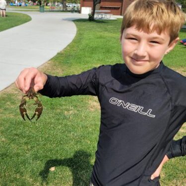 Boy with crayfish